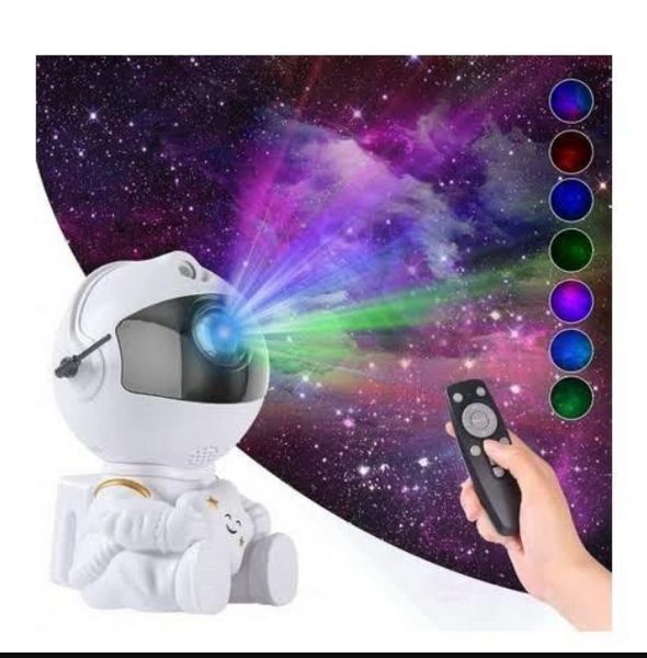 Нічник лазерний проєктор галактики Астронавт із зіркою в руках ABC 2136571298 фото
